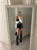 Jeans nero con borchie