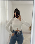 Top bianco a costine con lacci
