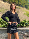 Maglione nero con lacci