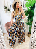 Tuta floreale con pantalone a pieghine
