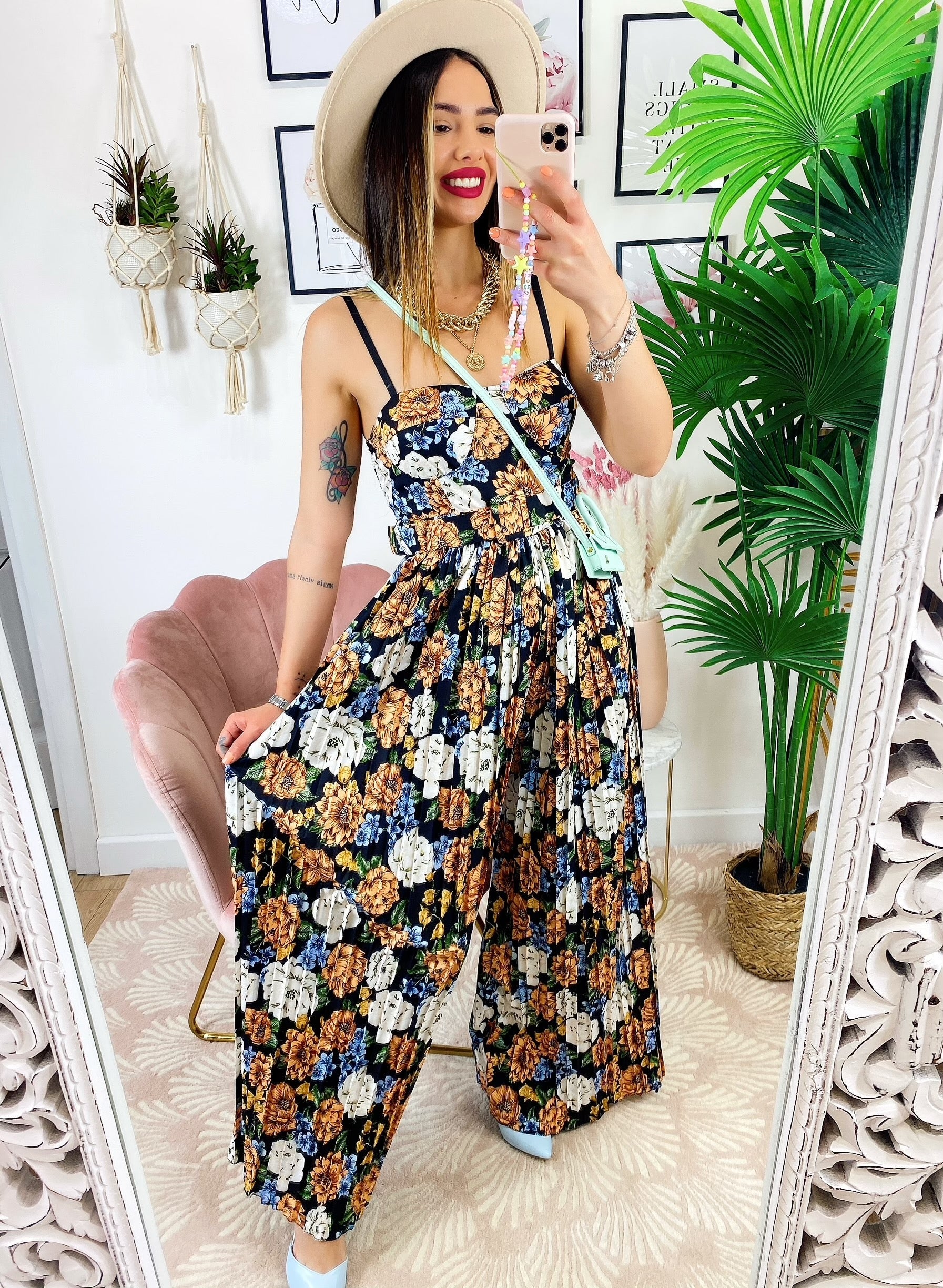 Tuta floreale con pantalone a pieghine