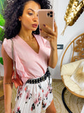 Short a pieghine con fiori rosa