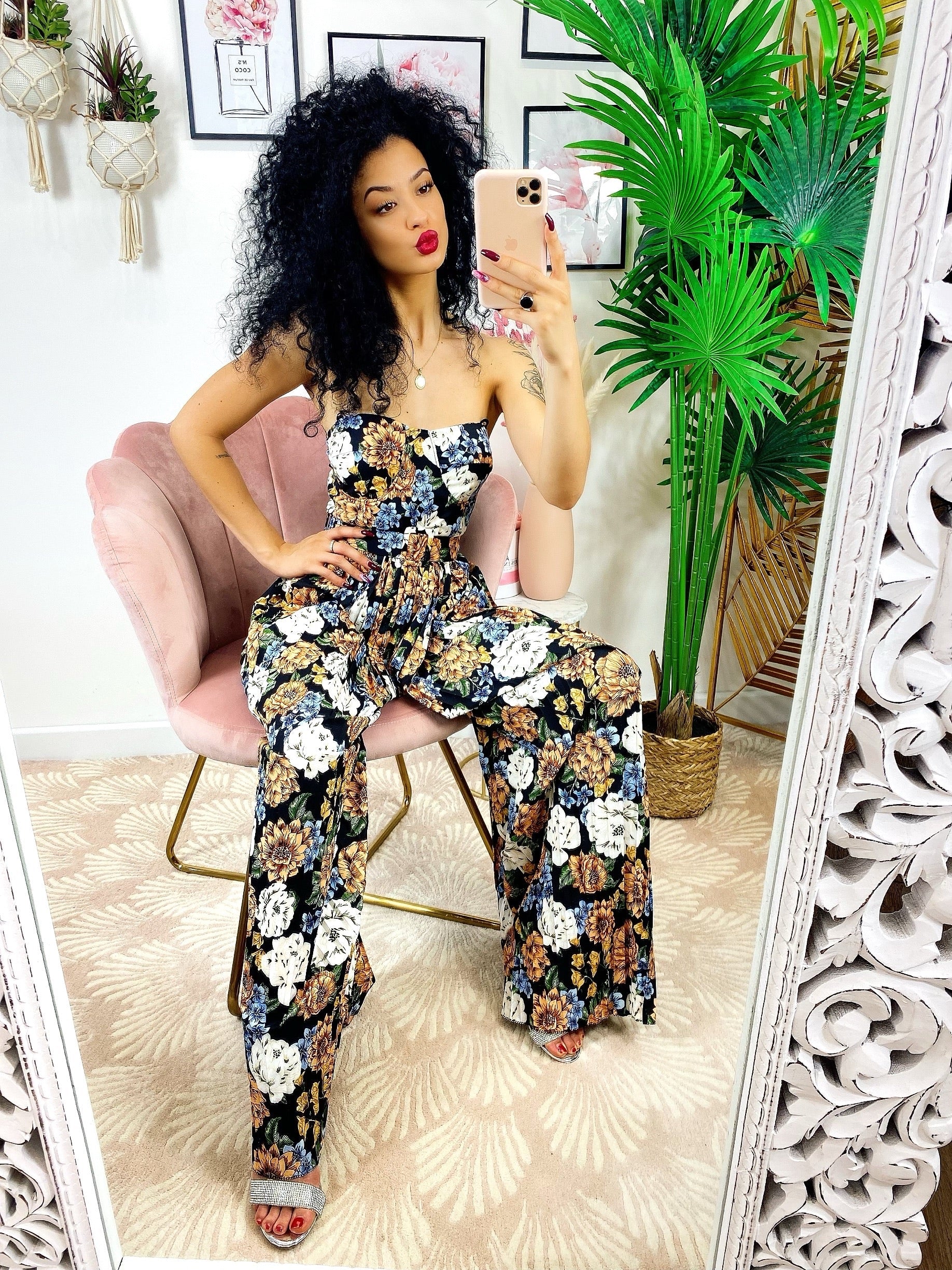 Tuta floreale con pantalone a pieghine