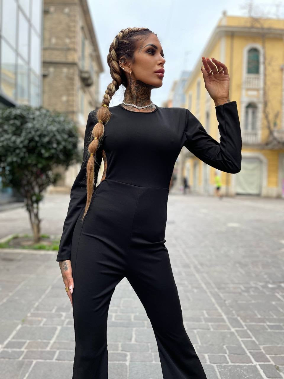 Tuta schiena aperta