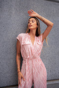 Tuta plissè rosa con cintina