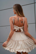 Abito corto beige con pizzo