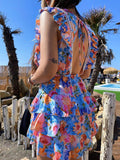 Abito a fiori azzurro schiena aperta