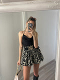 Top in raso con catena argento