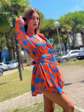Abito arancio fiori azzurri