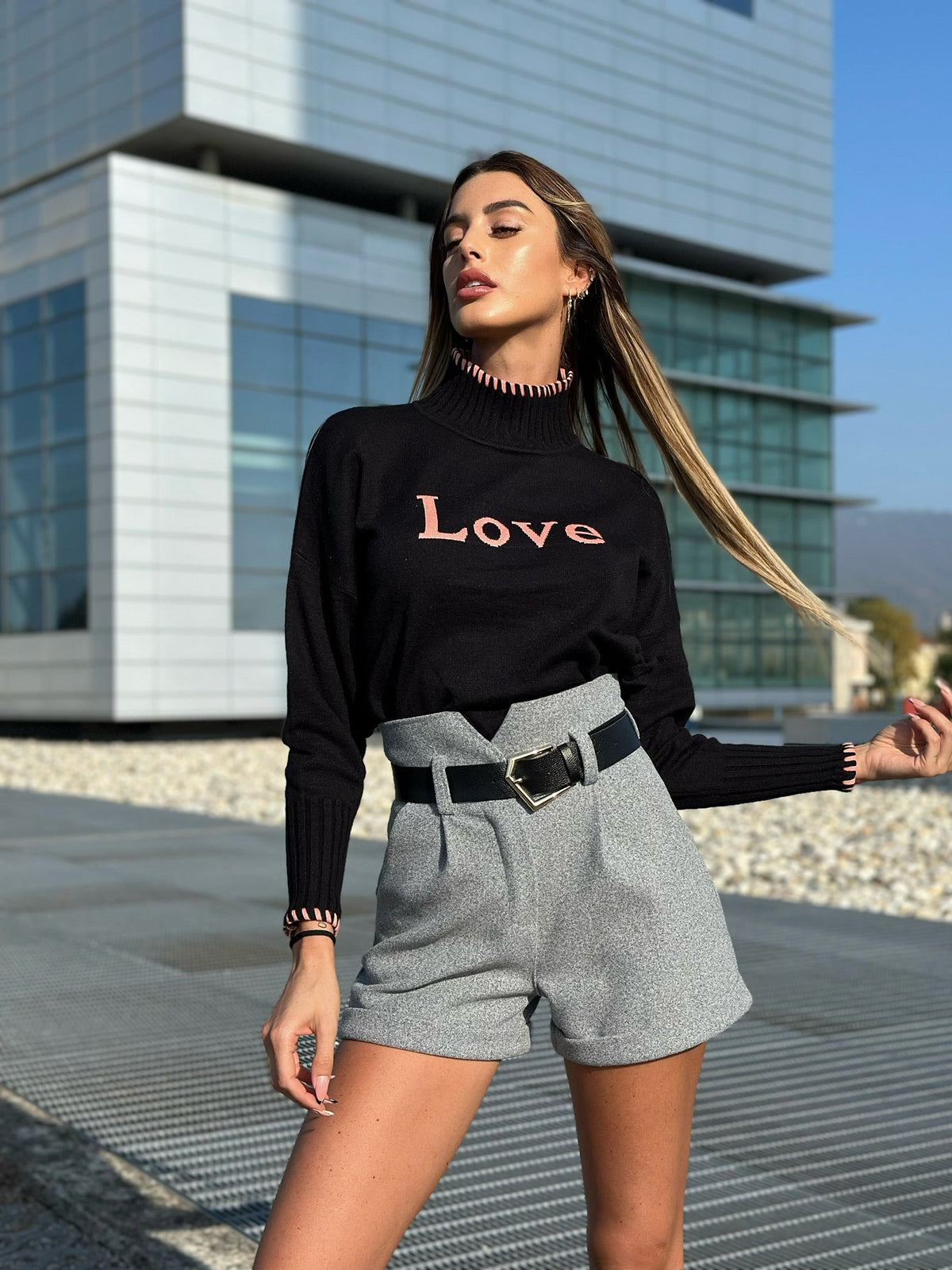 Pull nero e rosa