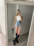 Short in jeans con perle e tulle