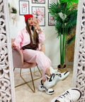 Completo sportivo con righe Rosa