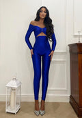 Tuta aderente blu con spilla silver