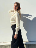 Maglione collo alto con rose Panna