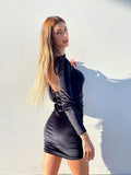 Abito in velluto schiena aperta con strass nero