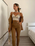 Top con paillettes gold