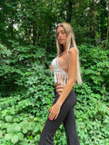 Pantalone a zampa con trasparenze