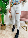 Jeans bianco con strappo sul lato B
