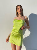 Abito in raso lime con dettaglio luce