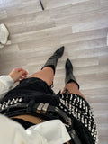 Jeans nero con borchie