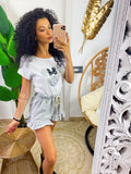 T-shirt con stampa glitter argento