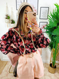 Camicia fiorata base nera