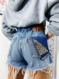 Short Levi’s Vintage bagno medio con borchie