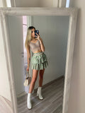 Gonna a balze con fiorellini verde