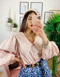Camicetta a quadri con scollo a V