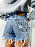 Short Levi’s Vintage bagno chiaro con borchie