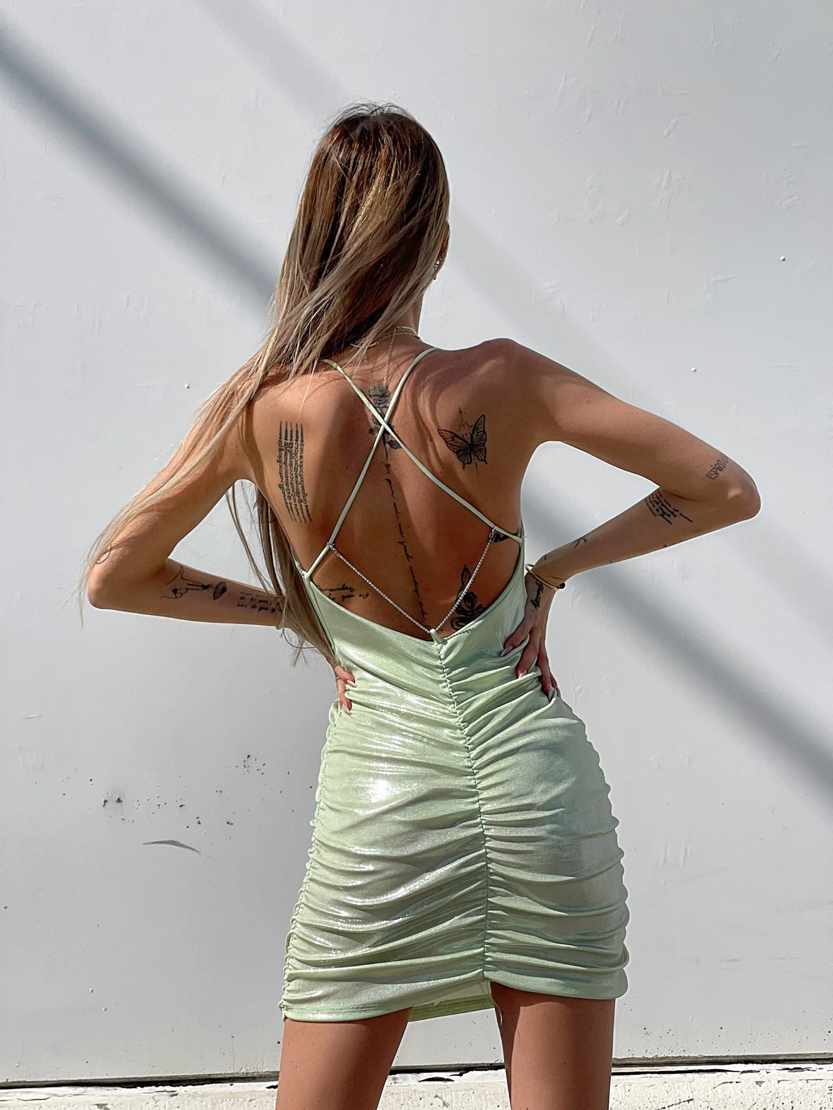 Abito menta con incrocio e push up