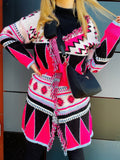 Cardigan fuxia con frange e cinta