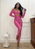 Tuta aderente Fuxia con spilla silver