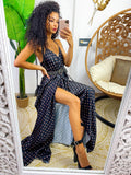 Abito in raso con maxi spacco nero a pois