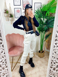 Pantalone bianco con marsupio