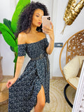 Abito lungo con scollo a barchetta con pois nero