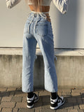 Jeans con catena argento