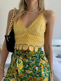 Top in pizzo giallo con pizzo