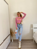 jeans con dettaglio aperture e catene