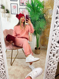 Completo maglia e pantalone rosa