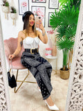 Pantalone a zampa stampa bandana Nero