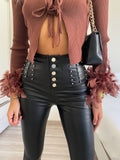 Pantalone in ecopelle con strass