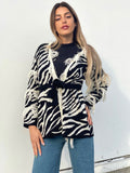 Cardigan zebrato nero con frange e cinta