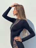 Tubino nero con trasparenze e strass