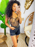 Short nero con bottoncini