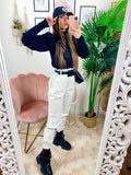 Pantalone bianco con marsupio