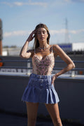 Body rosa con fiori
