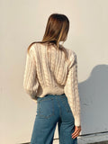 Maglione a trecce Panna