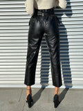 Pantalone in ecopelle con cintura