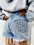 Short Levi’s Vintage bagno chiaro con borchie